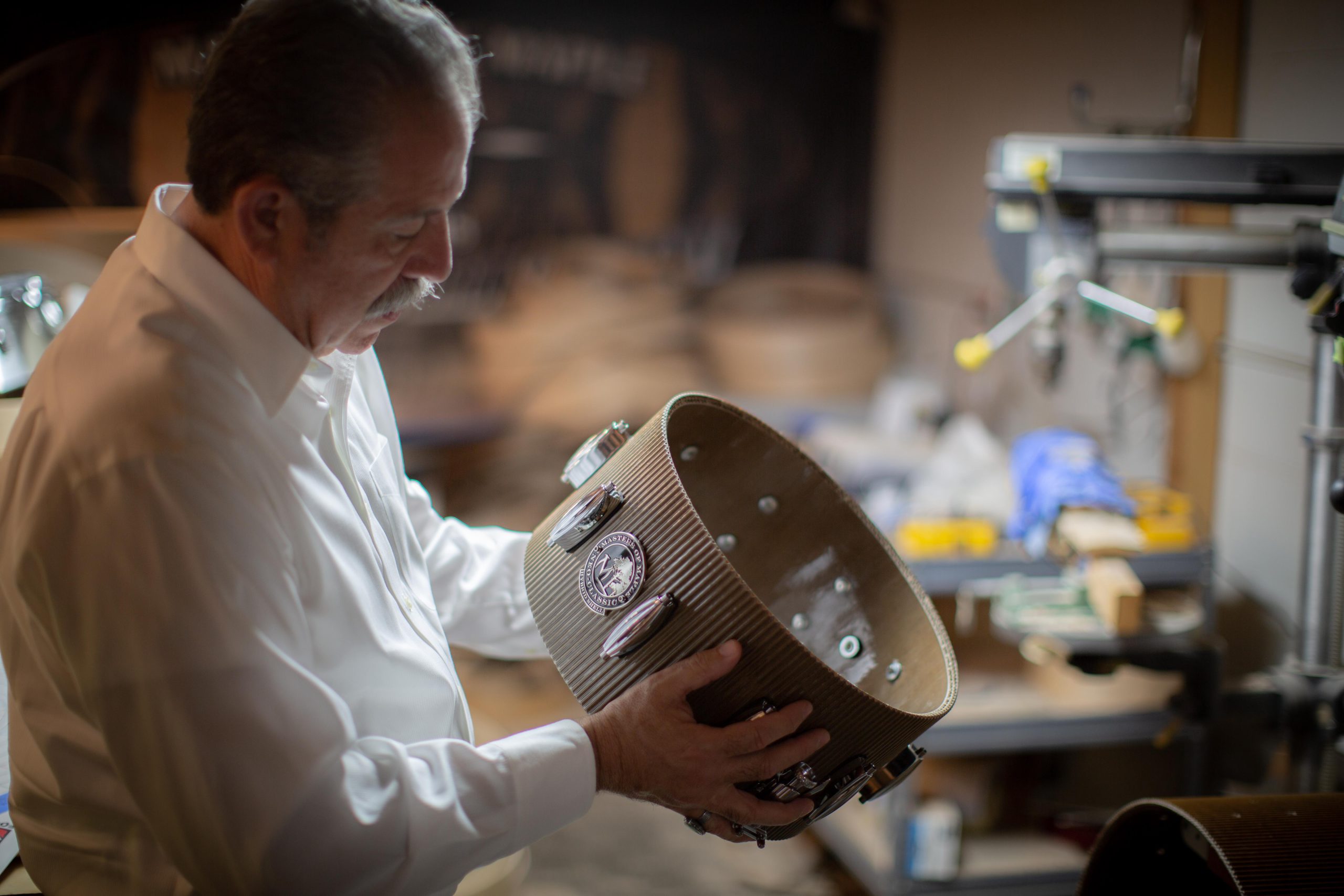 Mike Martinez crafting the cardboard drum kit