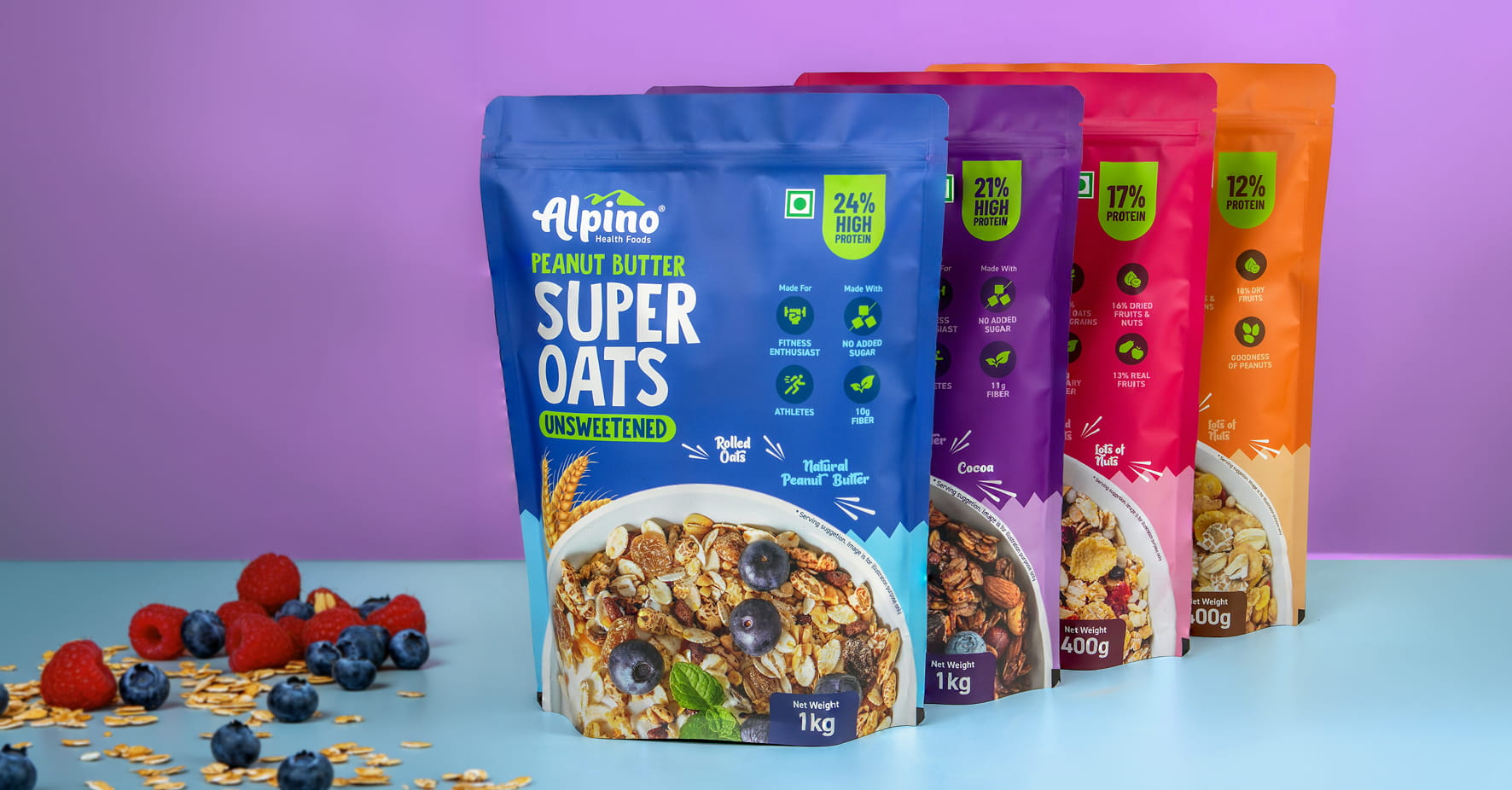 Four colorful Alpino Health Foods Super Oats pouches in blue, purple, pink, and orange, displayed with berries.